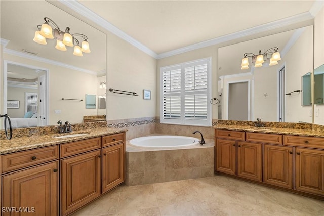 bathroom featuring vanity, tiled tub, crown molding, and tile patterned flooring