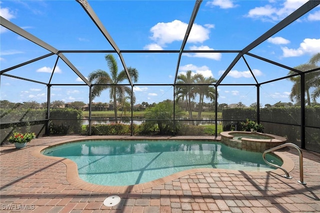 view of pool featuring an in ground hot tub, a water view, a patio, and glass enclosure