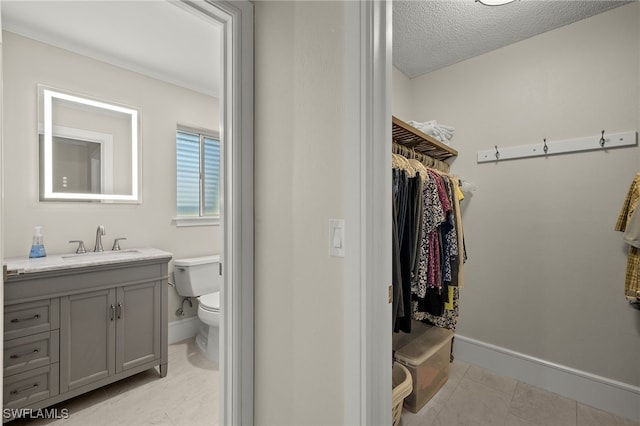 2347 Club House Rd, North Fort Myers, FL 33917 - walk in closet with light tile patterned floors and a sink