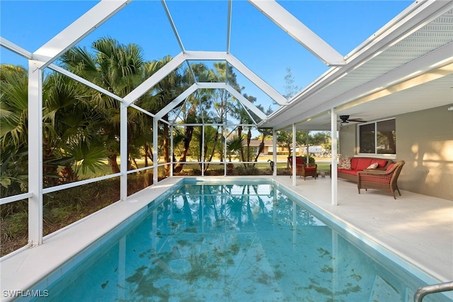 2347 Club House Rd, North Fort Myers, FL 33917 - outdoor pool featuring glass enclosure, outdoor lounge area, a ceiling fan, and a patio