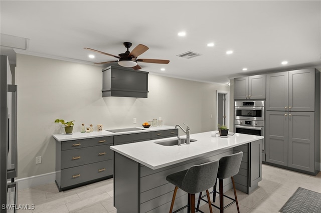 2347 Club House Rd, North Fort Myers, FL 33917 - kitchen with visible vents, a ceiling fan, a sink, crown molding, and appliances with stainless steel finishes