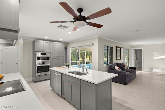 2347 Club House Rd, North Fort Myers, FL 33917 - kitchen featuring visible vents, stainless steel appliances, light countertops, and gray cabinetry