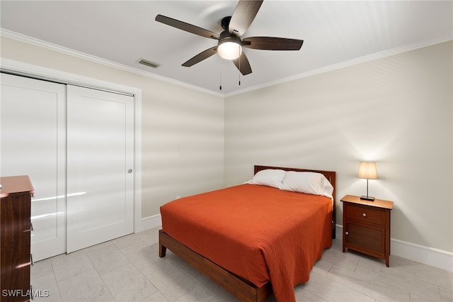 2347 Club House Rd, North Fort Myers, FL 33917 - bedroom with baseboards, visible vents, a ceiling fan, a closet, and ornamental molding