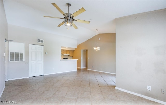 tiled spare room with ceiling fan with notable chandelier, high vaulted ceiling, visible vents, and baseboards