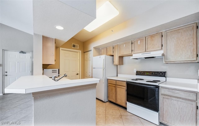 kitchen with freestanding refrigerator, light countertops, range with electric stovetop, and under cabinet range hood