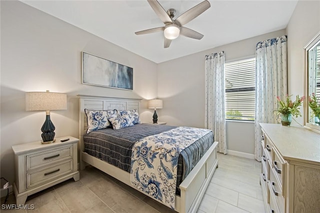 bedroom featuring ceiling fan and light tile patterned flooring