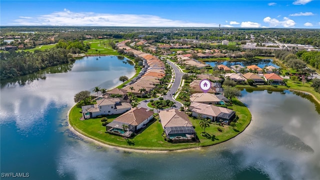 birds eye view of property featuring a residential view and a water view