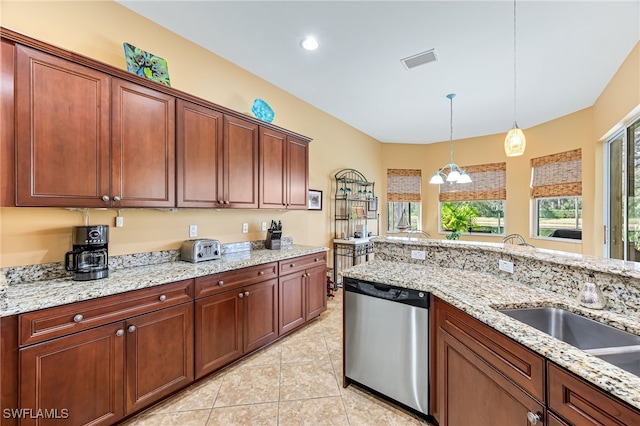 kitchen featuring hanging light fixtures, stainless steel dishwasher, plenty of natural light, and visible vents