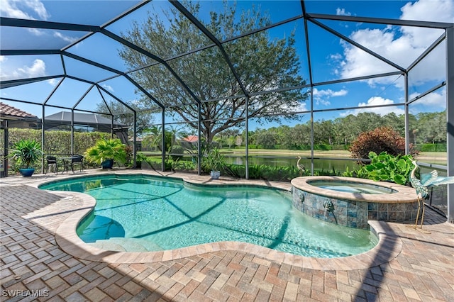 view of swimming pool featuring a patio, glass enclosure, a water view, and a pool with connected hot tub