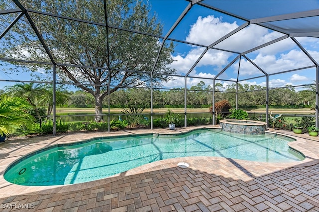 view of swimming pool with a lanai, a patio area, and a pool with connected hot tub