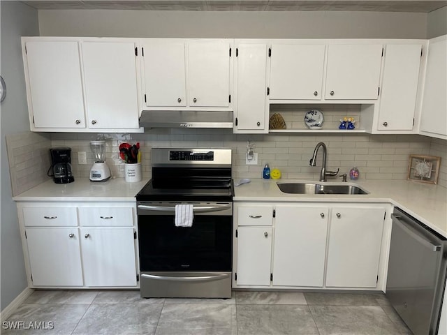 kitchen featuring open shelves, a sink, light countertops, under cabinet range hood, and appliances with stainless steel finishes