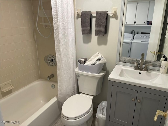 bathroom with washer and clothes dryer, vanity, toilet, and shower / tub combo