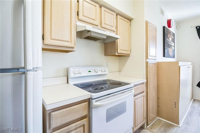 kitchen with refrigerator, white electric stove, light brown cabinetry, and light hardwood / wood-style floors