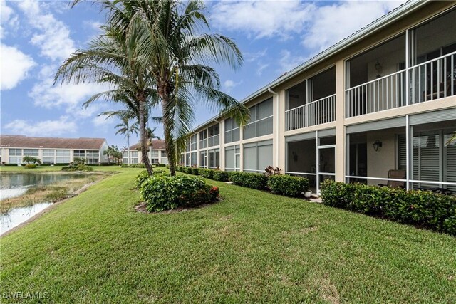 exterior space with a water view