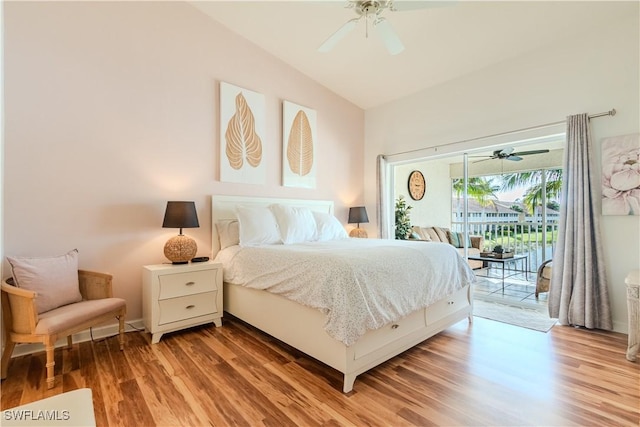 bedroom featuring light wood-type flooring, access to exterior, a ceiling fan, and vaulted ceiling