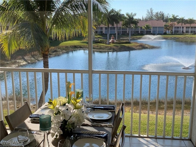 balcony featuring a water view