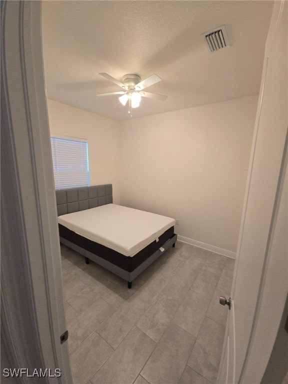 unfurnished bedroom with ceiling fan