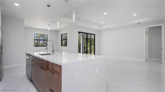 1420 Poinsettia Ave, Lehigh Acres, FL 33972 - kitchen with a sink, recessed lighting, open floor plan, a tray ceiling, and modern cabinets