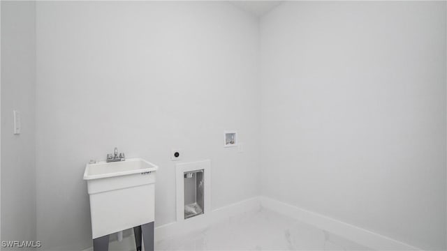 1420 Poinsettia Ave, Lehigh Acres, FL 33972 - washroom featuring laundry area, marble finish floor, hookup for a washing machine, a sink, and hookup for an electric dryer