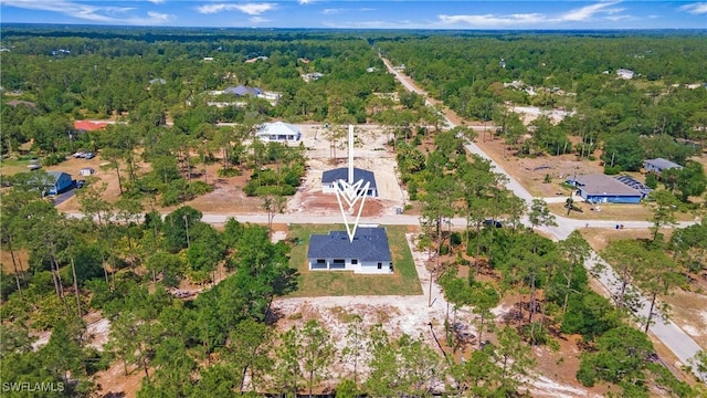 1420 Poinsettia Ave, Lehigh Acres, FL 33972 - aerial view featuring a forest view