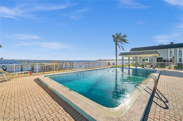 view of pool featuring a patio area