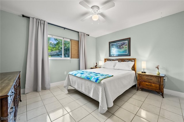 bedroom with light tile patterned floors and ceiling fan