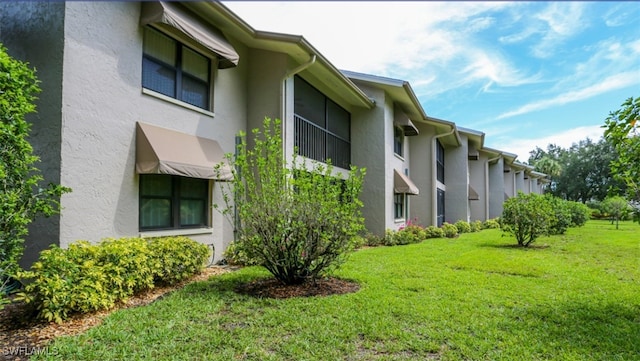 exterior space with a lawn