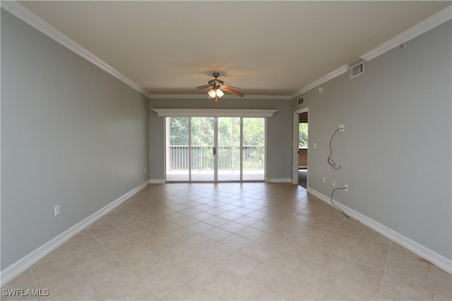 empty room featuring a ceiling fan, visible vents, baseboards, and crown molding