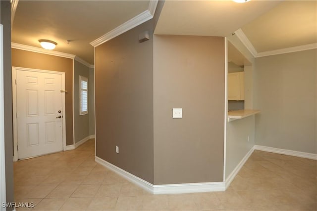 interior space featuring light tile patterned floors, baseboards, and crown molding