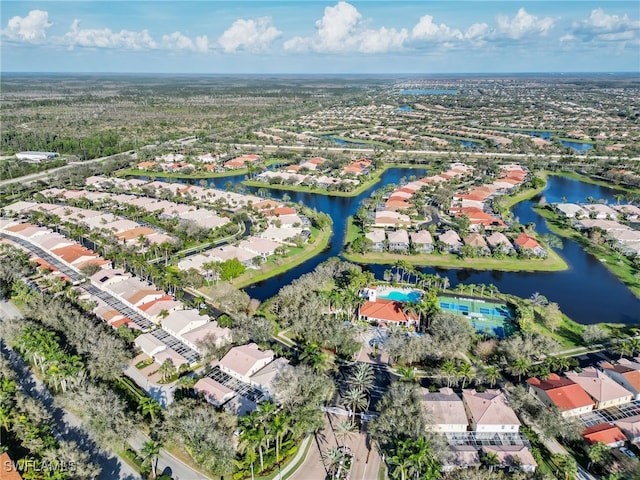 aerial view featuring a water view and a residential view