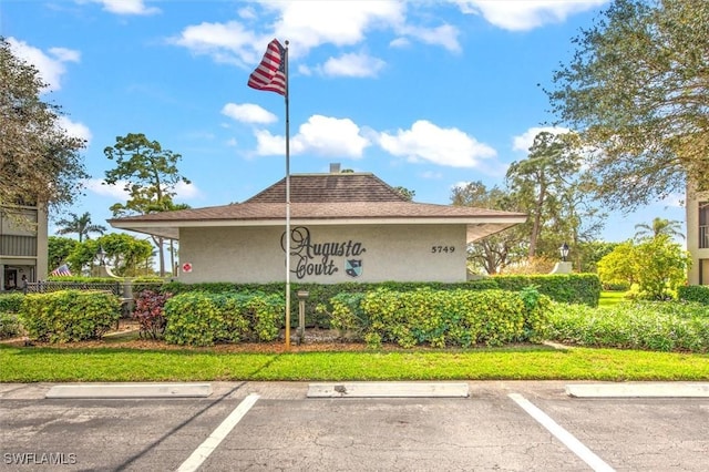 view of community sign