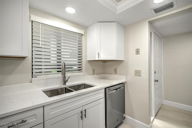 kitchen featuring sink, light hardwood / wood-style flooring, dishwasher, light stone countertops, and white cabinets