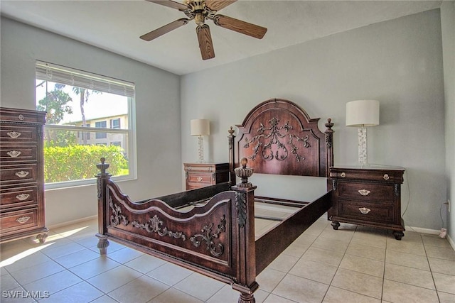 1100 Pondella Rd Unit 807, Cape Coral, FL 33909 - bedroom with light tile patterned flooring, baseboards, and ceiling fan