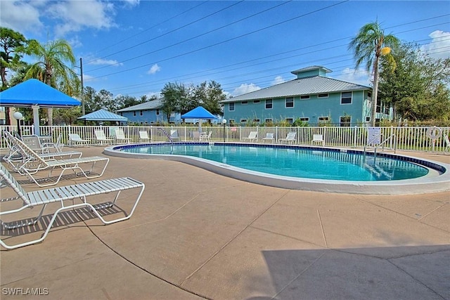 1100 Pondella Rd Unit 807, Cape Coral, FL 33909 - community pool with a patio
