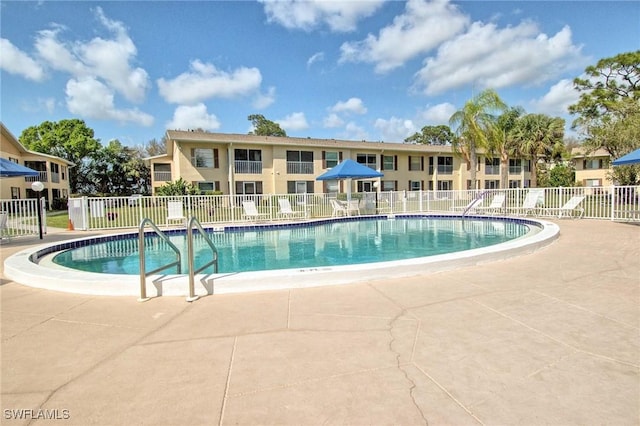 1100 Pondella Rd Unit 807, Cape Coral, FL 33909 - community pool with a patio area