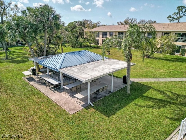 1100 Pondella Rd Unit 807, Cape Coral, FL 33909 - view of property's community featuring a yard and a patio
