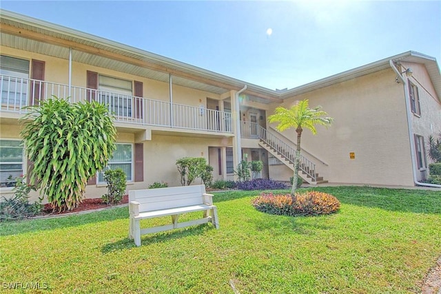 1100 Pondella Rd Unit 807, Cape Coral, FL 33909 - view of building exterior featuring stairs