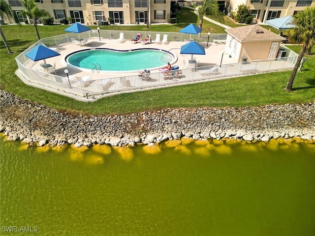 1100 Pondella Rd Unit 807, Cape Coral, FL 33909 - community pool featuring a patio and a water view