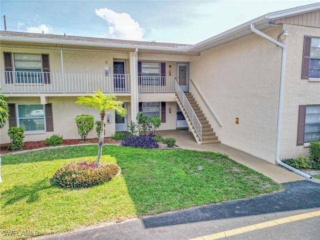 1100 Pondella Rd Unit 807, Cape Coral, FL 33909 - view of property with stairway