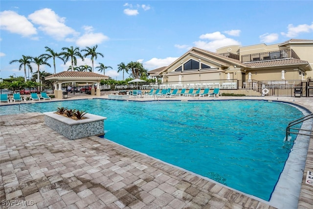 view of pool featuring a gazebo and a patio area