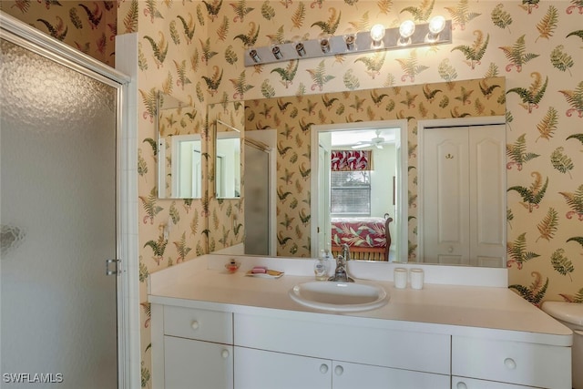 bathroom featuring vanity and walk in shower