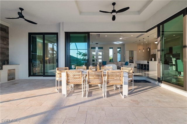 view of patio featuring ceiling fan