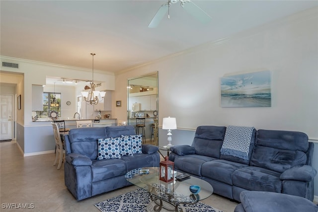 living room featuring ornamental molding and ceiling fan with notable chandelier