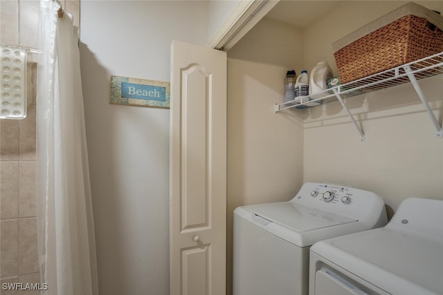 washroom featuring separate washer and dryer