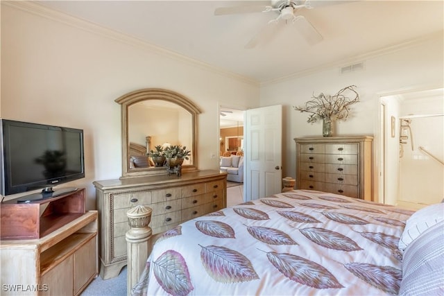725 Saratoga Cir Unit A103, Naples, FL 34104 - bedroom featuring visible vents, connected bathroom, crown molding, and a ceiling fan