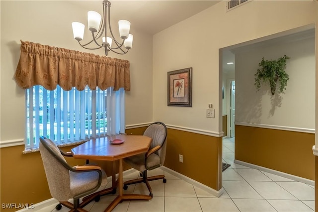 725 Saratoga Cir Unit A103, Naples, FL 34104 - dining area with an inviting chandelier, visible vents, tile patterned floors, and baseboards