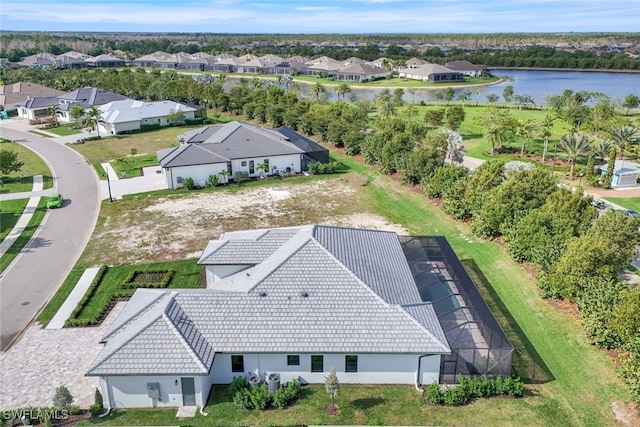 bird's eye view with a residential view and a water view