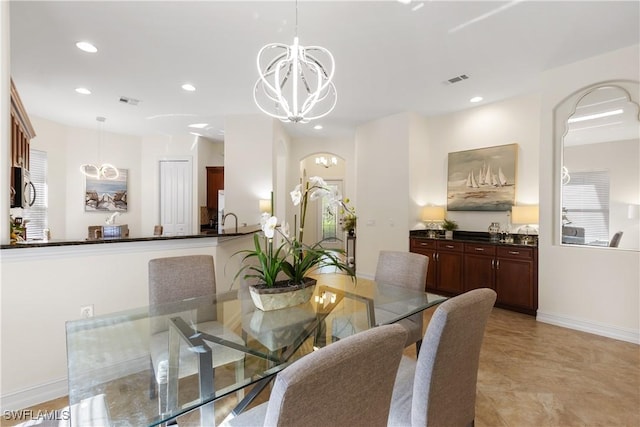 dining area with a chandelier