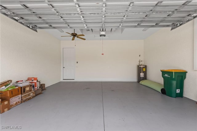 garage with ceiling fan, a garage door opener, and electric water heater