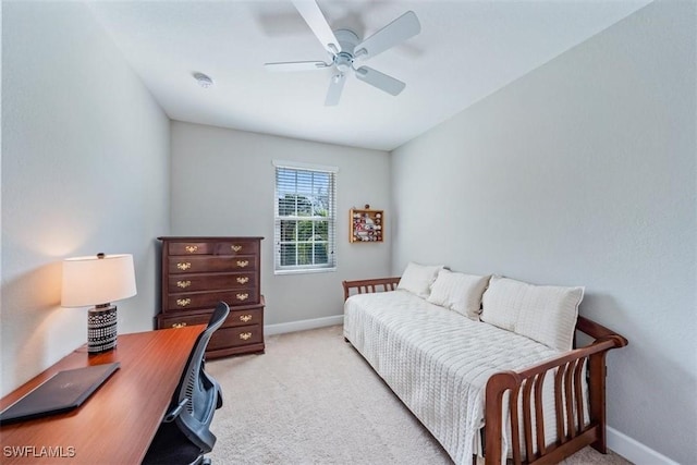 bedroom with light carpet and ceiling fan